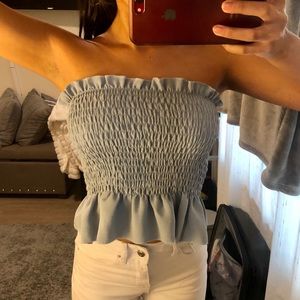 light blue ruffle top
